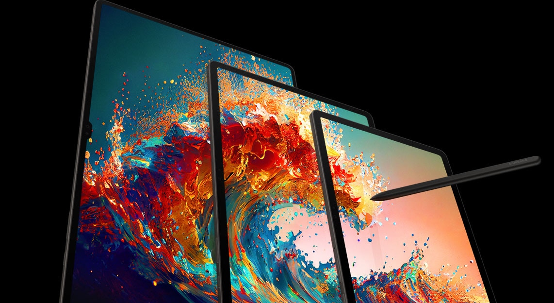 Galaxy Tab S9, S9+ and S9 Ultra are lined up next to each other in Portrait mode with a colorful wave wallpaper on all screens. Splashes of water are surrounding the three devices and an S Pen is pointed at the screen of Galaxy Tab S9.